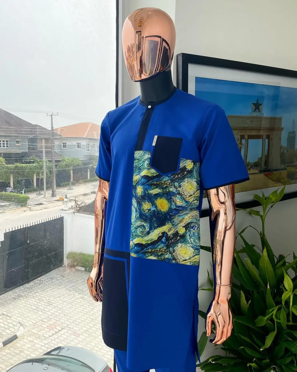 A 3 sector, cloud pattern paisley, royal and navy blue box section, front flap with Swarovski button detailing kaftan native.