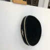 A Black and Gold Ceremonial African Traditional Hat