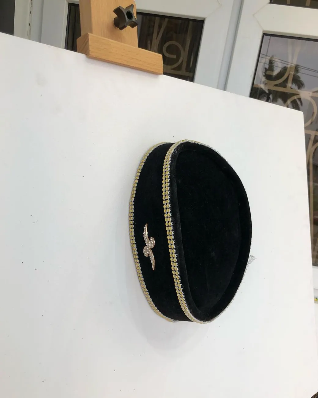 A Black and Gold Ceremonial African Traditional Hat