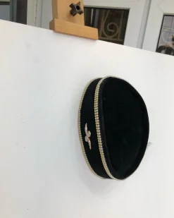 A Black and Gold Ceremonial African Traditional Hat
