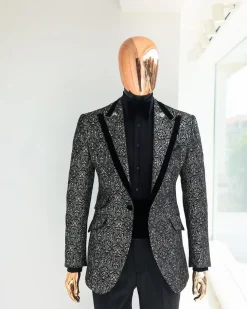 A Black and rust silver pattern jacquard, peak lapel tuxedo suit.