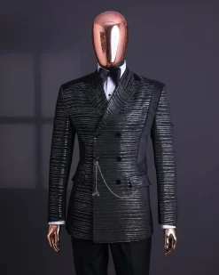 A Black and silver broom metallic scratch pattern jacquard, peak lapel tuxedo, tapered shoulder, double breasted suit