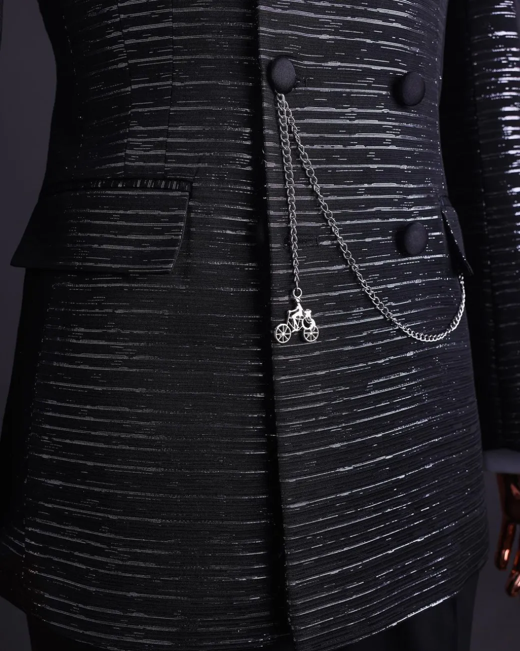 A Black and silver broom metallic scratch pattern jacquard, peak lapel tuxedo, tapered shoulder, double breasted suit