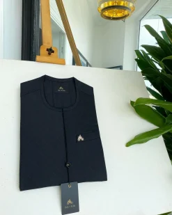 A Black inverted pencil stripe details African traditional senator kaftan native