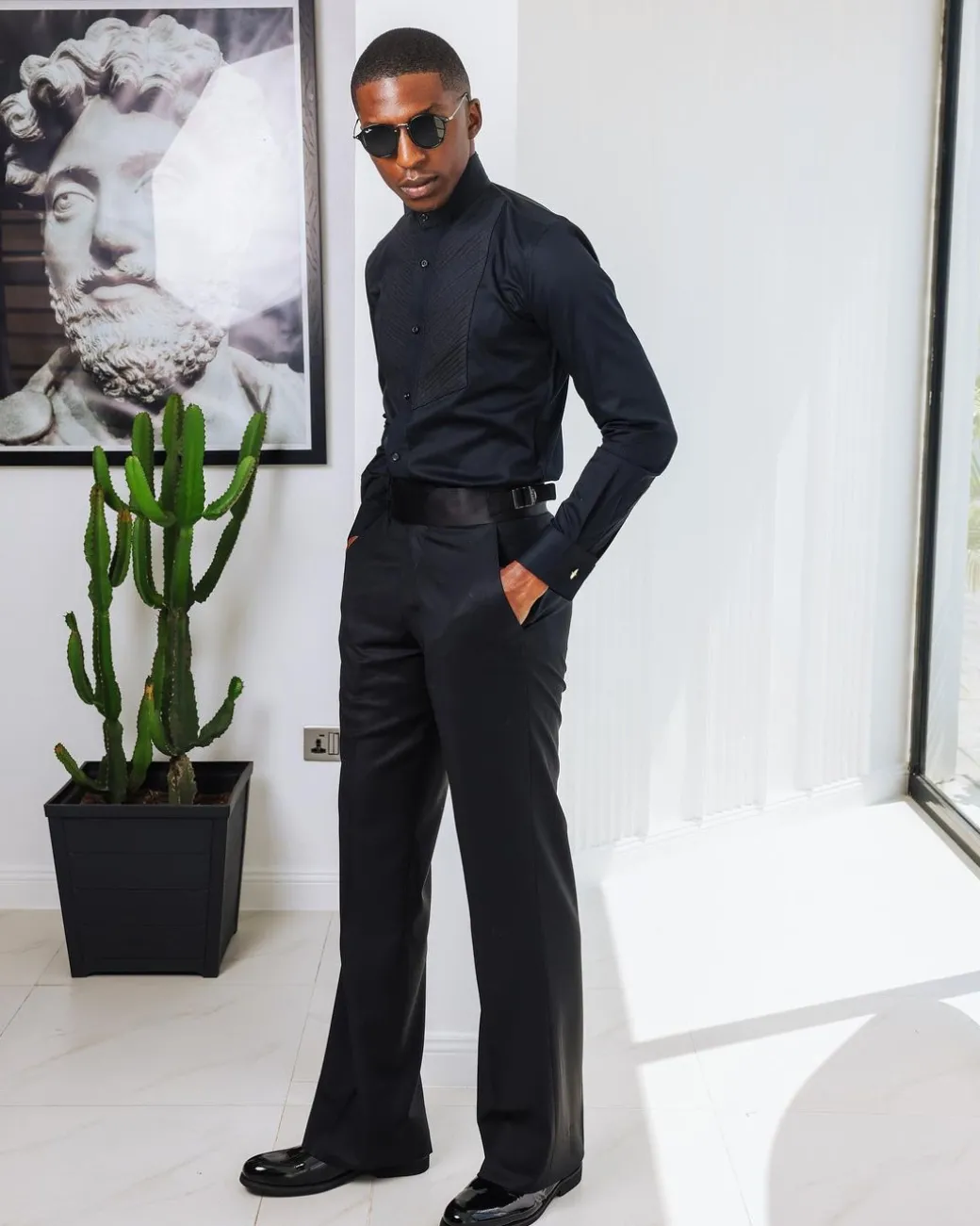 A Black, Wing Collar, Pleated Evening Tuxedo Shirt.