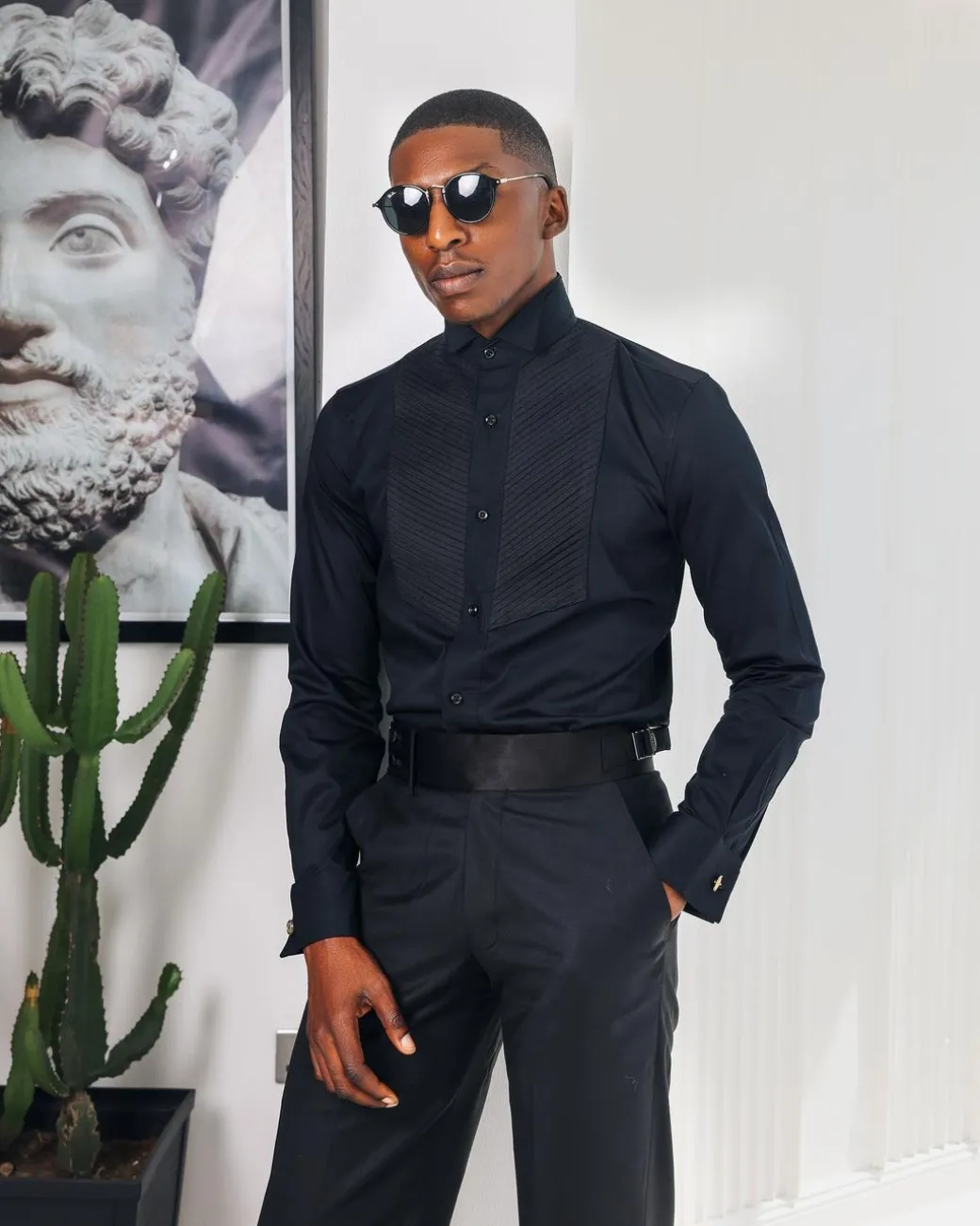 A Black, Wing Collar, Pleated Evening Tuxedo Shirt.
