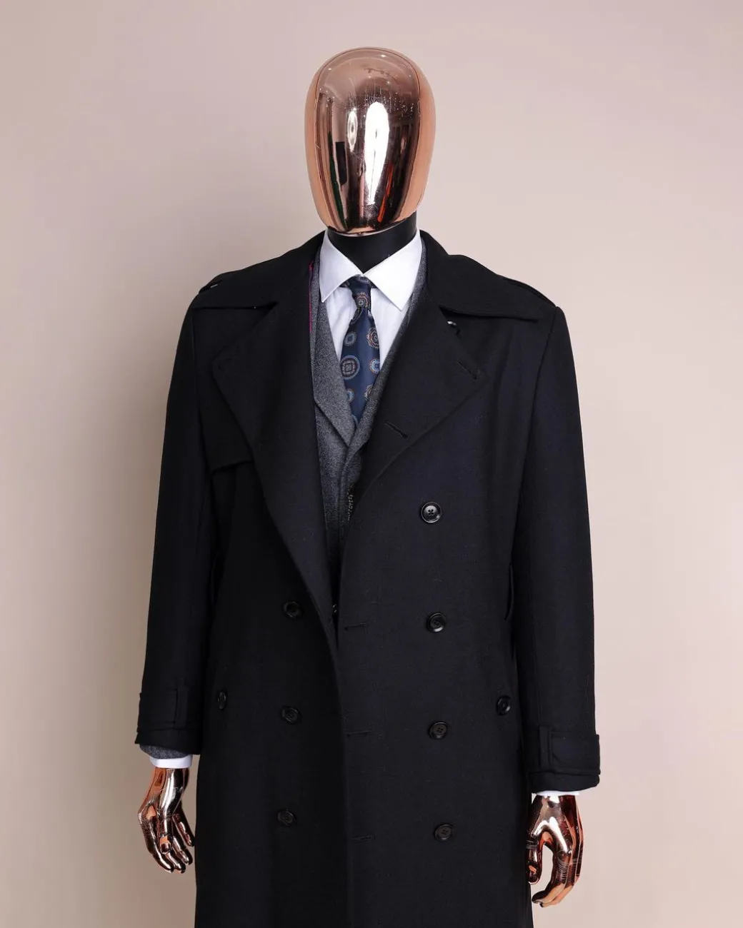 A black wool trench jacket, Cloud Grey, knitted, peak lapel jorgecarli vogue suit