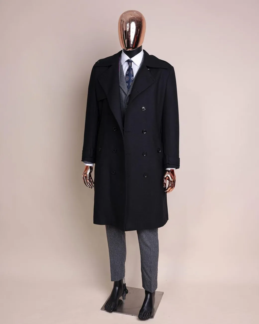 A black wool trench jacket, Cloud Grey, knitted, peak lapel jorgecarli vogue suit