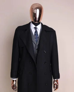 A black wool trench jacket, Cloud Grey, knitted, peak lapel jorgecarli vogue suit