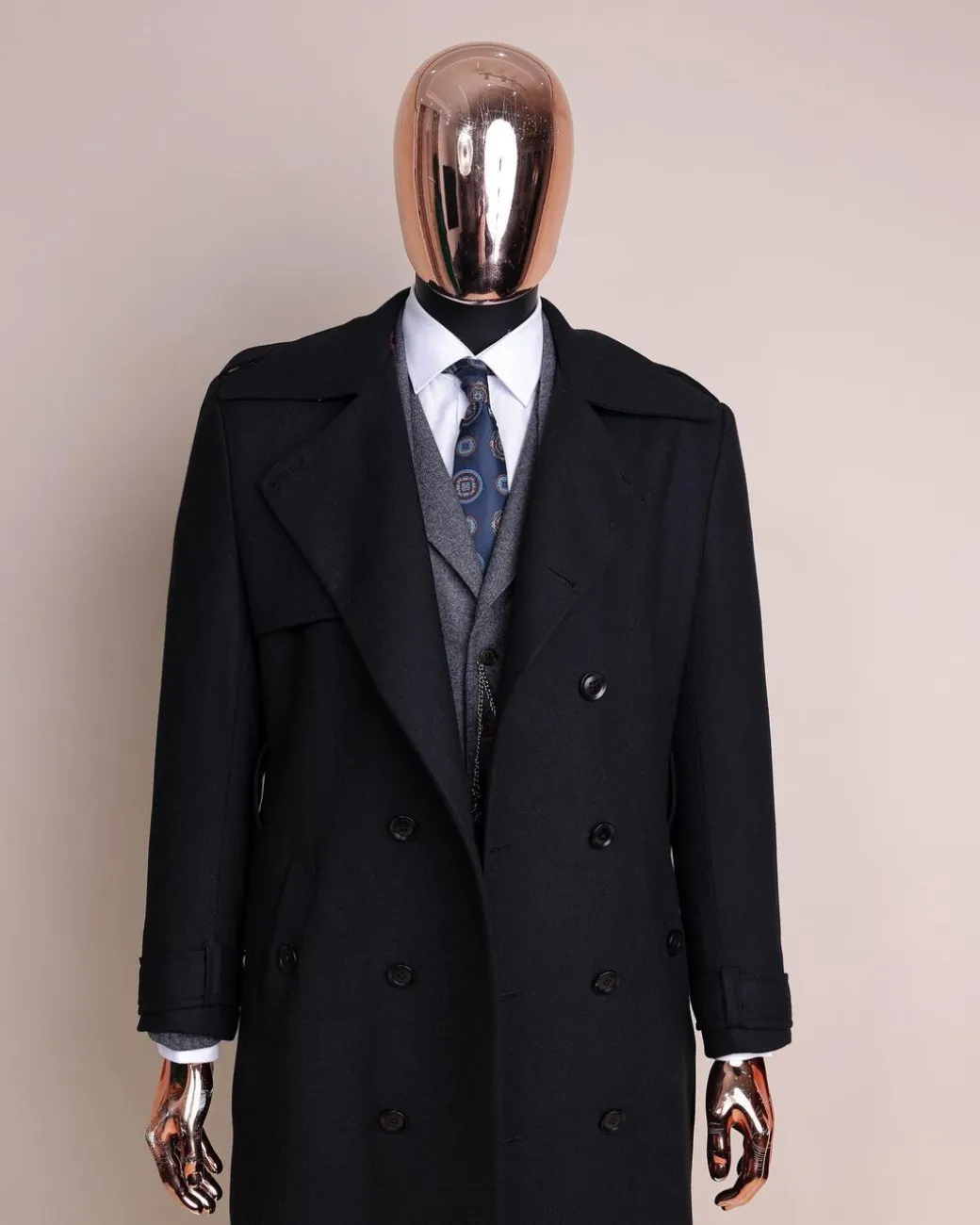 A black wool trench jacket, Cloud Grey, knitted, peak lapel jorgecarli vogue suit