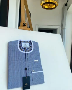 A blue and white windowpane check, front flap details African traditional senator kaftan native.