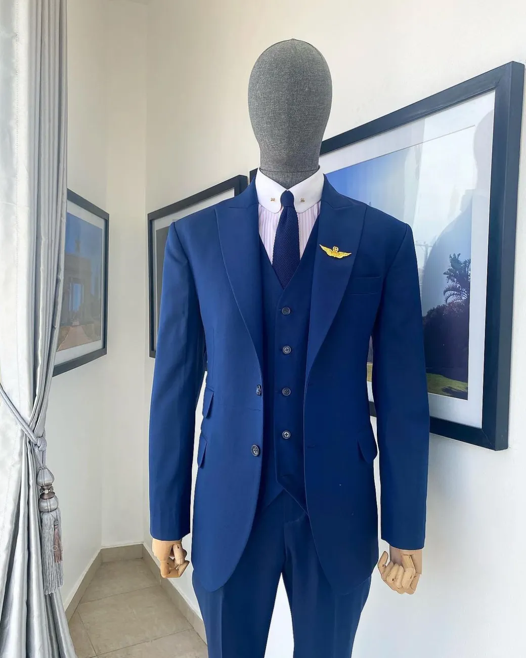 A “Board Room” Navy Blue Peak Lapel Suit