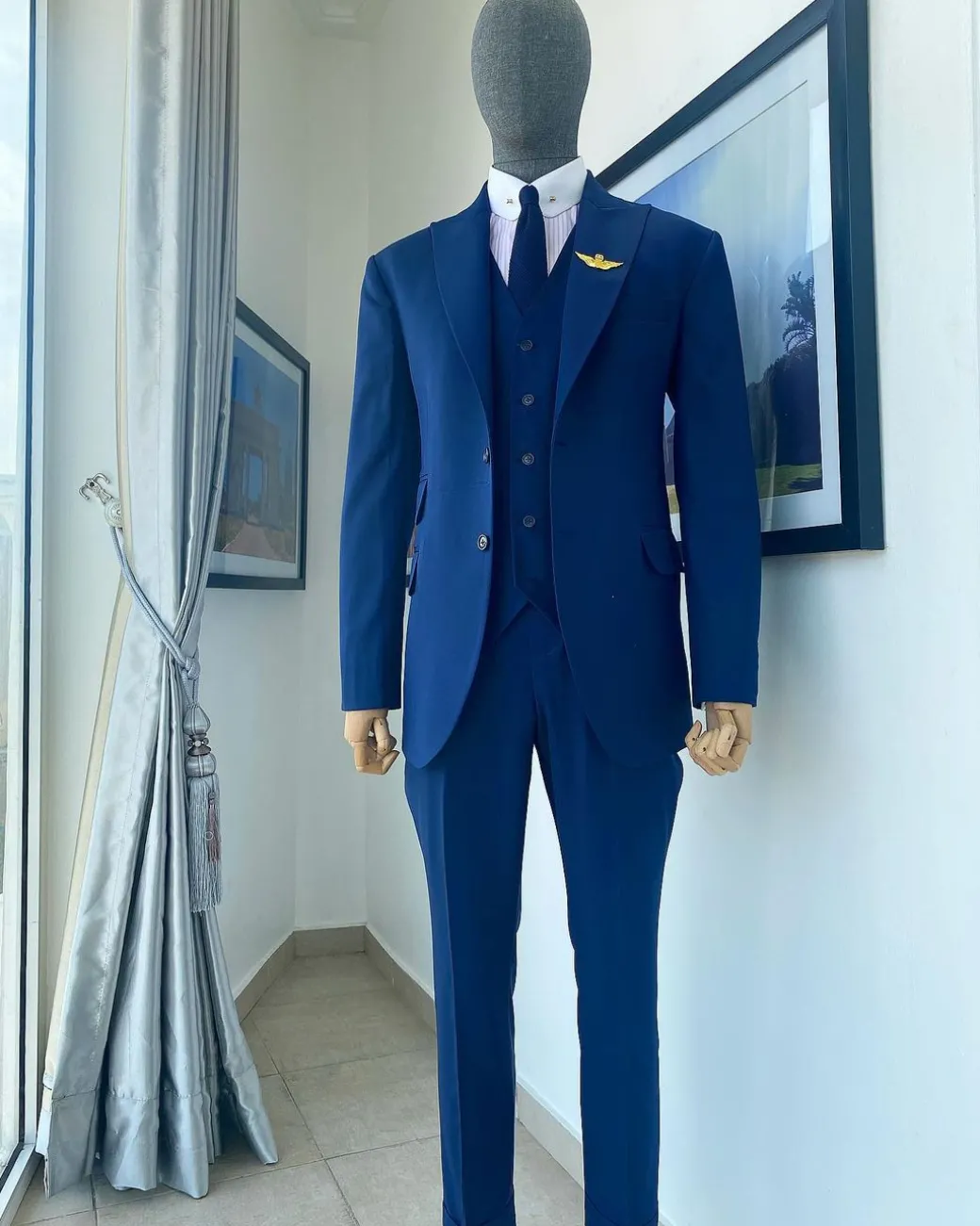 A “Board Room” Navy Blue Peak Lapel Suit