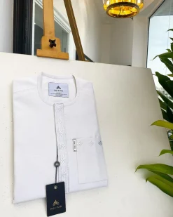 A bold stripe white, patch pocket front flap with embroidery details African traditional senator kaftan native