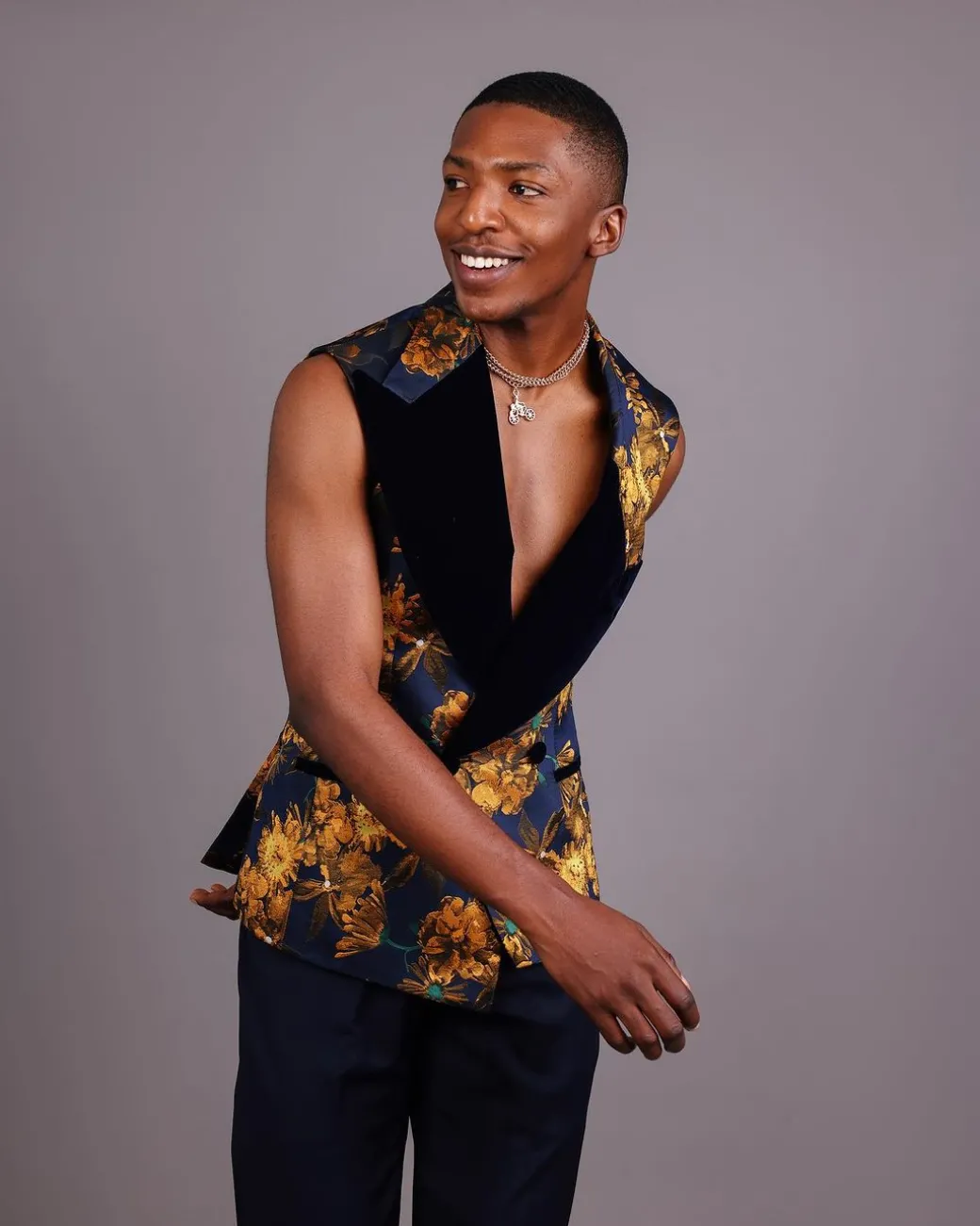 A “Boomerang” Sleeveless, Adjusted Peak Lapel Floral Jacquard Tuxedo Suit & Wide Cut Pant Trouser.