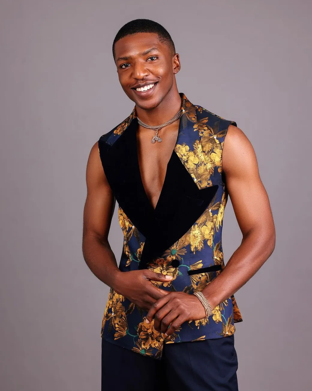 A “Boomerang” Sleeveless, Adjusted Peak Lapel Floral Jacquard Tuxedo Suit & Wide Cut Pant Trouser.