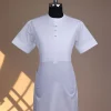 A bright white, front flap with Swarovski button, invisible zip line neck details, short sleeve African kaftan