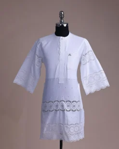 A bright white, Swiss patterned lace, front flap with side pattern, Swarovski button, 3/4 sleeve African kaftan native.