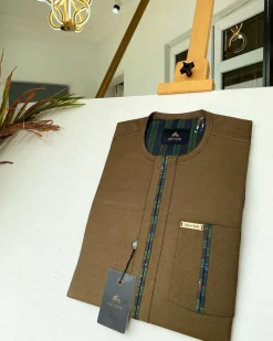 A brown African kaftan with a lining divisional design and Sokoto