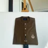 A Brown kaftan, button front flap, gold metal detailing, and silver Swarovski African Kaftan and Sokoto