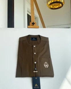 A Brown kaftan, button front flap, gold metal detailing, and silver Swarovski African Kaftan and Sokoto