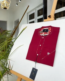 A Burgundy African Kaftan with silver Swarovski buttons, paisley detailing and sokoto