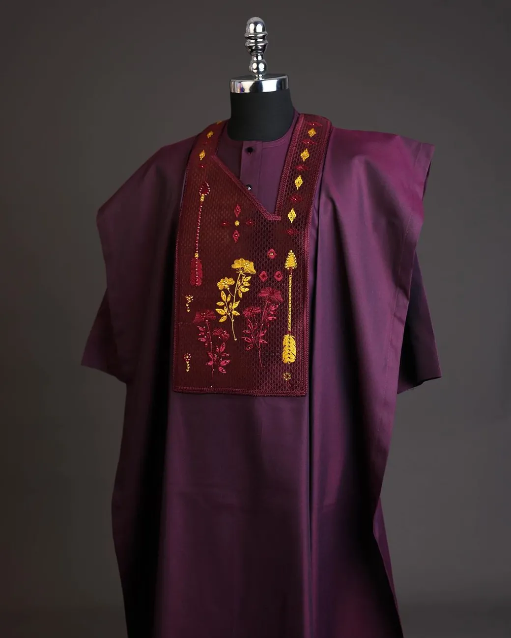 A Burgundy, arrow & floral metallic wire embroidery design silver Swarovski stone details agbada