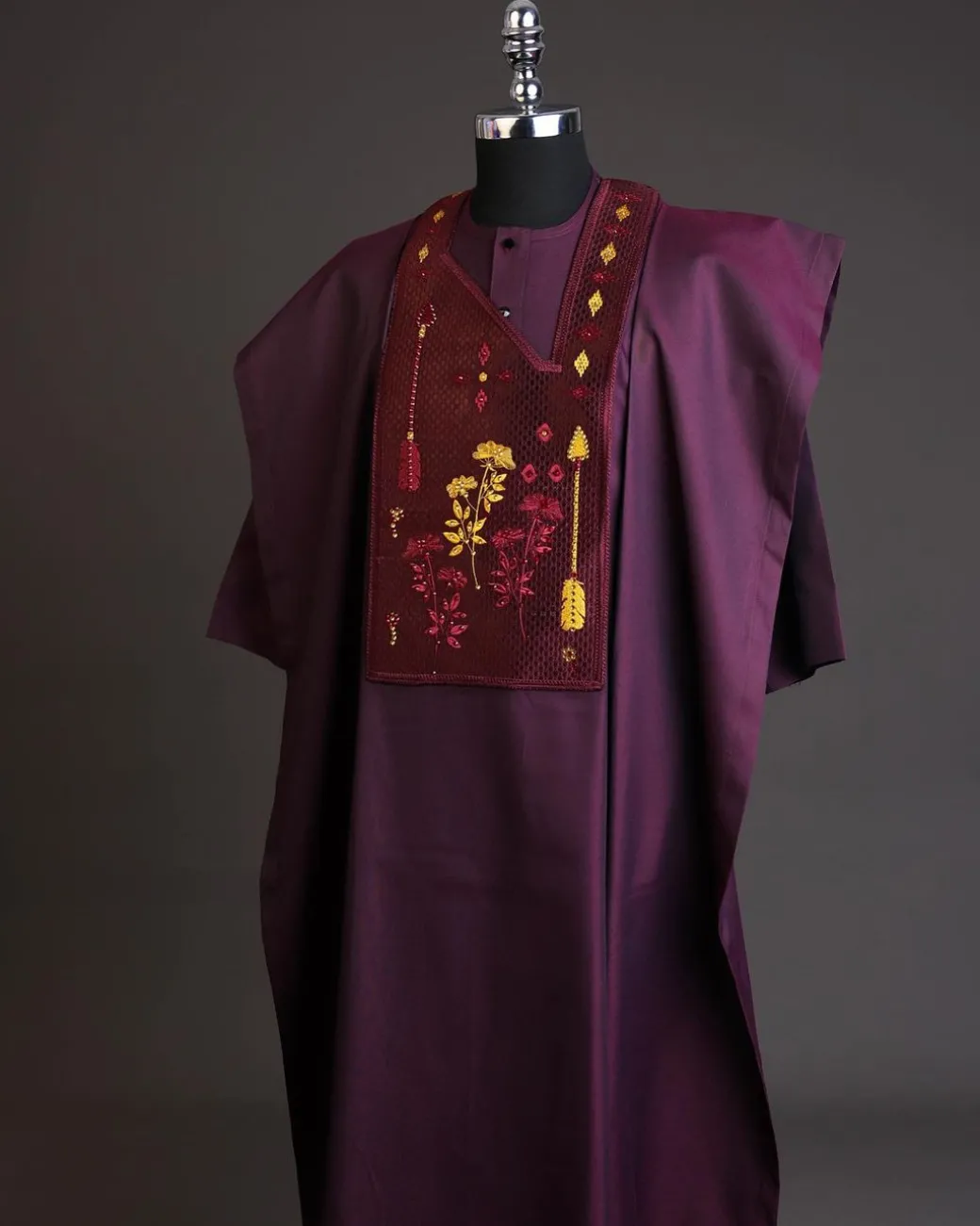 A Burgundy, arrow & floral metallic wire embroidery design silver Swarovski stone details agbada