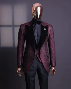 A burgundy, black broom splashed metallic jacquard, knitted, peak lapel tuxedo suit