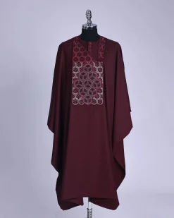 A burgundy, Connected inverted cube -layered 3D embroidery design with splashed burgundy ss30 Swarovski stone details Agbada