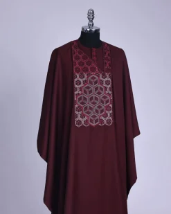 A burgundy, Connected inverted cube -layered 3D embroidery design with splashed burgundy ss30 Swarovski stone details Agbada