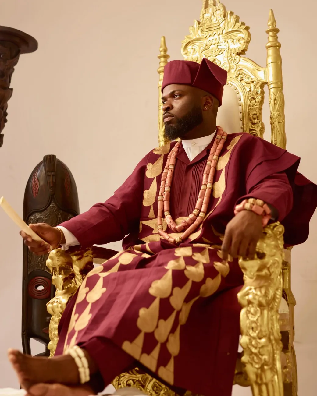 A Burgundy, deltagbada flapper embroidery details agbada