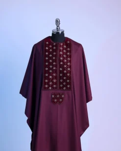A burgundy, grommet eyelet on dropping octa embroidery details Agbada