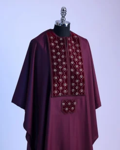 A burgundy, grommet eyelet on dropping octa embroidery details Agbada