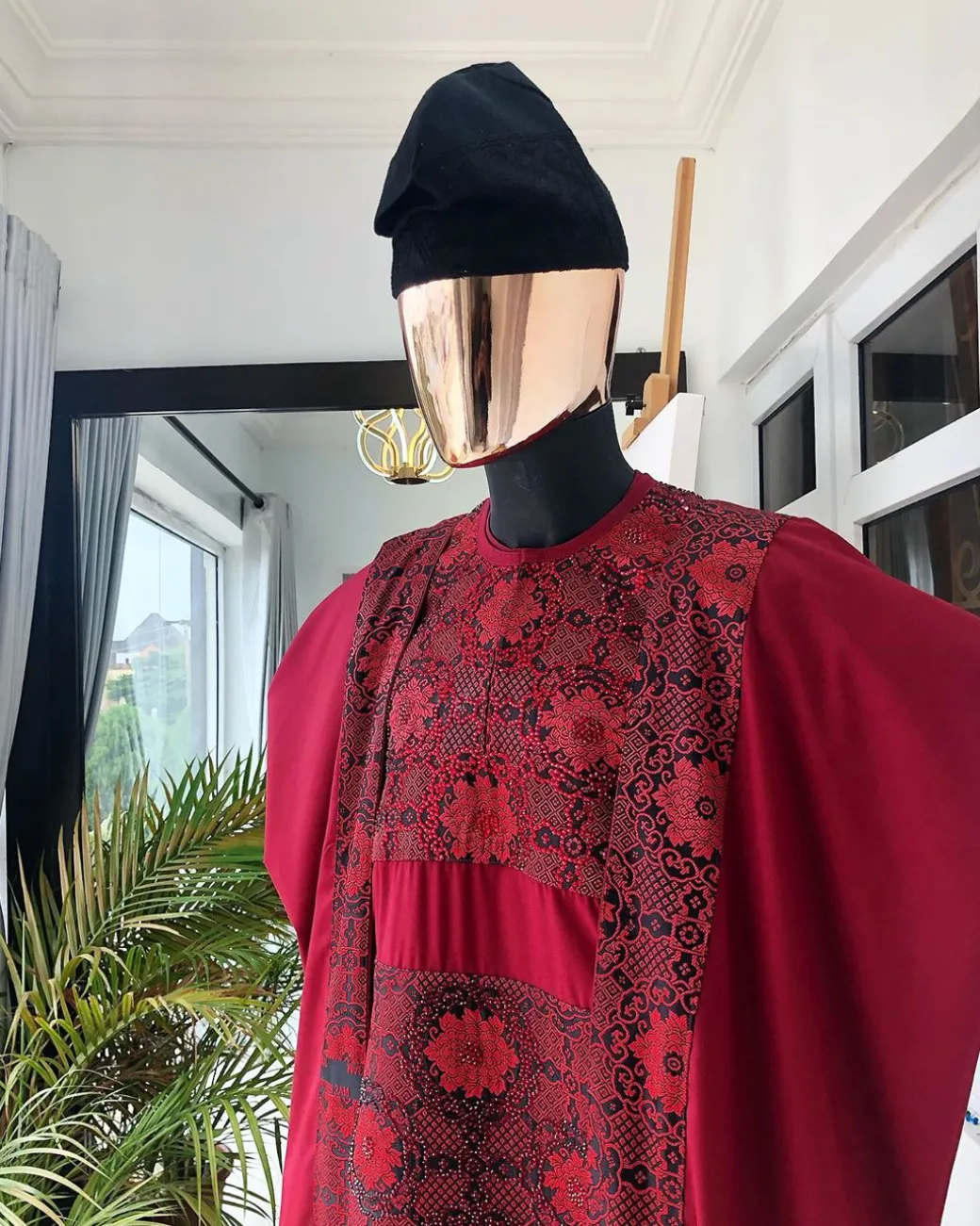 A burgundy metallic embroidery Agbada with black mixed jacquard, Swarovski burgundy stone detailing