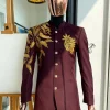 A burgundy safari suit with gold floral pattern embroidery detailing