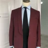 A Burgundy shawl lapel Suit With Accessories Detailing and pant