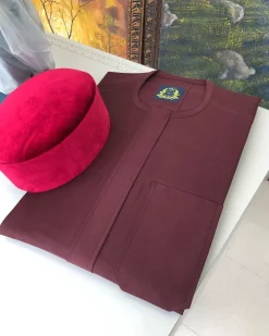 A Burgundy with a front flap African Kaftan and Red Velvet Hat