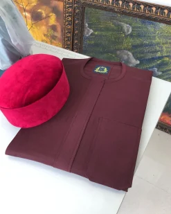 A Burgundy with a front flap African Kaftan and Red Velvet Hat