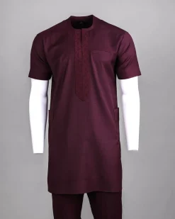 A Burgundy, zip line with arewa embroidery, shirt sleeve African senator kaftan native.