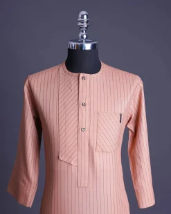 A Cantaloupe orange with a black pencil stripe and a front flap with black Swarovski buttons African senator, kaftan native