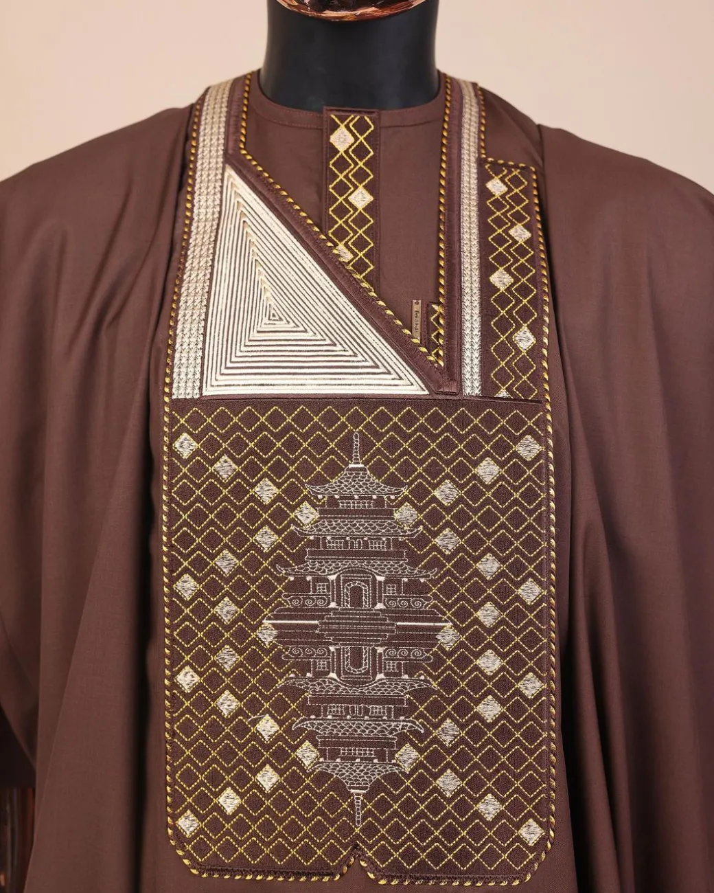 A Caramel Brown, chinoiserie chic pagoda with layers metallic wire embroidery details agbada