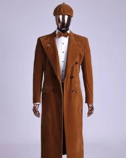 A Caramel brown, soaked velvet, peak lapel double breasted trench suit