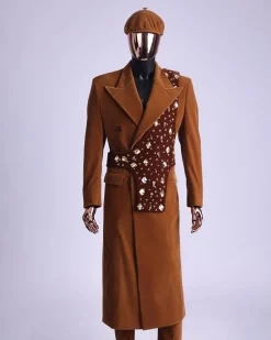 A Caramel brown, soaked velvet, peak lapel double breasted trench suit