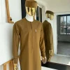 A Carton brown front flap detailing African kaftan