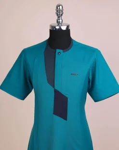 A Castleton green, front flap, patterned flap with black Swarovski button, short sleeve African senator kaftan native.