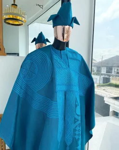 A Cerulean blue royal embroidery design agbada, dashiki, “abeti Aja” matching hat & sokoto