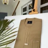 A Champagne Gold African kaftan with interlocking lane design and sokoto