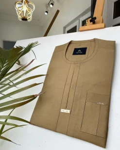 A Champagne Gold African kaftan with interlocking lane design and sokoto