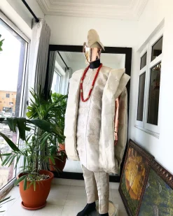 A Champagne Gold  Interconnected Embroidery 3 Piece Traditional Agbada